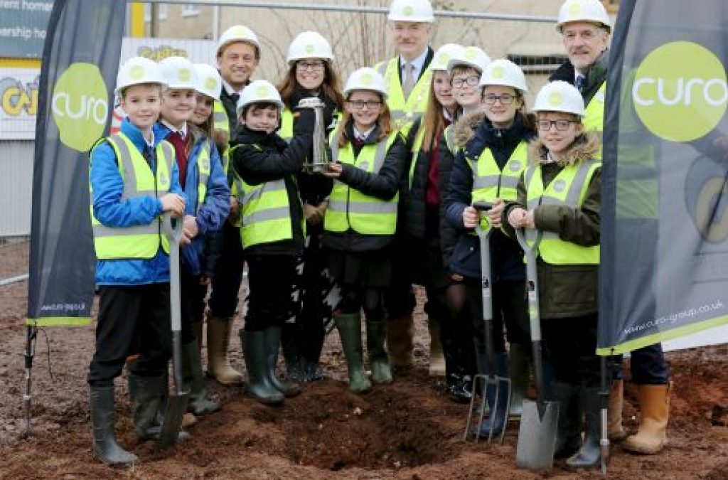 Schoolchildren bury time capsule in Midsomer Norton